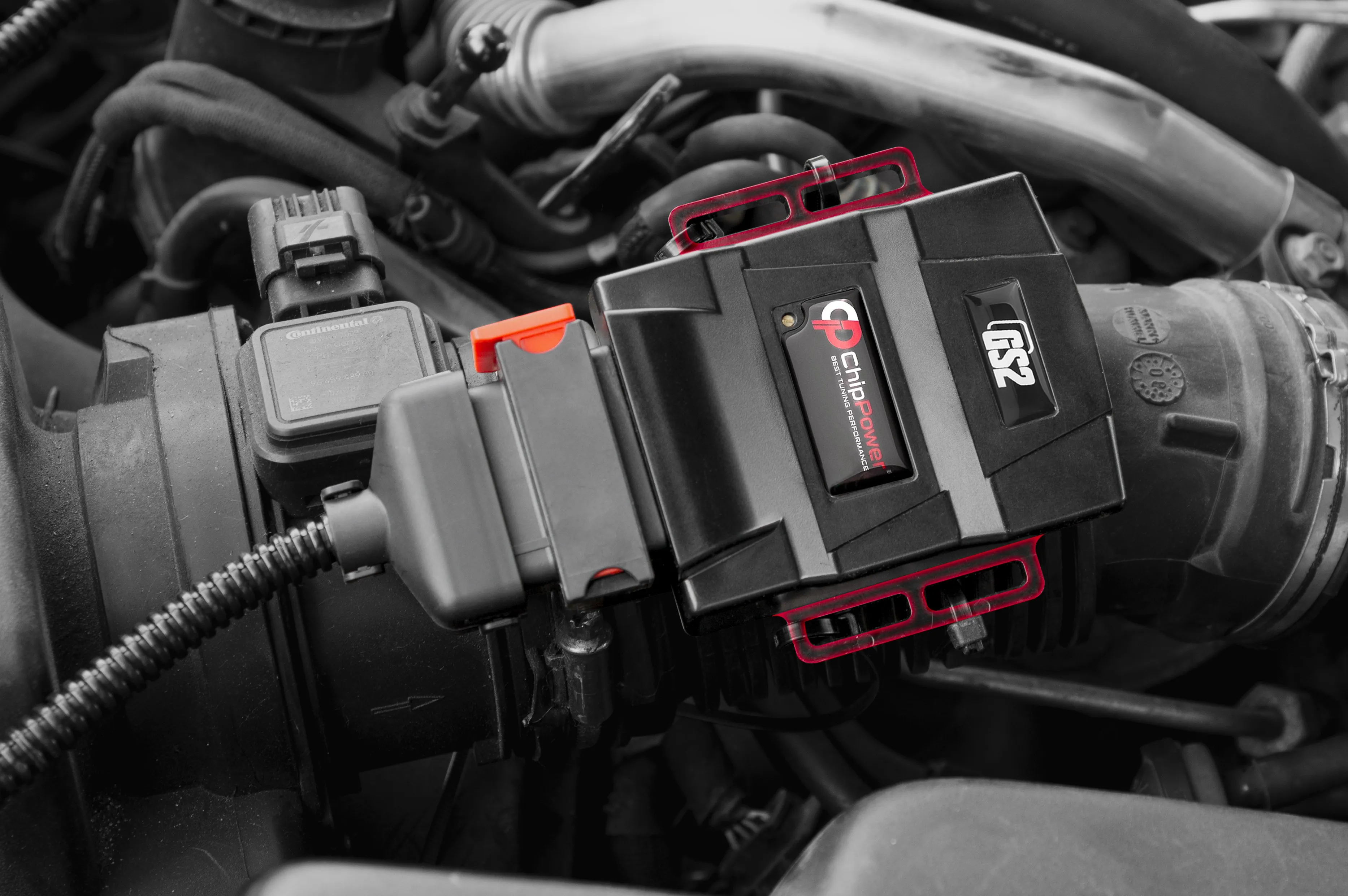 Exemple de montage d’un boîtier GS2 dans le compartiment moteur